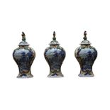 SET THREE CONTINENTAL POTTERY URNS