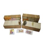 TWO BOXES OF CARTOON POSTCARDS