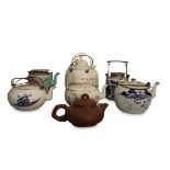 COLLECTION OF ORIENTAL TEAPOTS