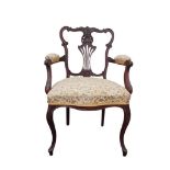 EDWARDIAN CARVED MAHOGANY ELBOW CHAIR