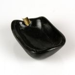 Hardstone (probably obsidian) ashtray with gold cigarette rest. - Signed [...]