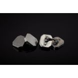 A Pair of Silver Cufflinks - Signed Cartier Sterling (NY), in a Cartier pouch [...]