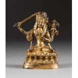 DARSTELLUNG DES MANJUSHRI China, 18. Jh. Bronze, vergoldet. H. ca. 11 cm. Im Boden gemarkt. Auf