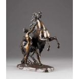 GUILLAUME COUSTOU1677 Lyon - 1746 Paris (Nachfolger)Pferdebändiger Bronze, braun patiniert. H. 37,