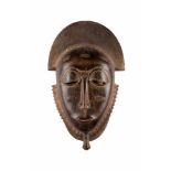 MASKE Im Stil der Baule, Elfenbeinküste, Afrika, 2. Hälfte 20. Jh. Holz. H: 37 cm. Provenienz: