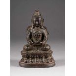 BUDDHA-FIGUR Tibet, 16./17. Jh. Bronze, dunkel patiniert. H. 20,5 cm. Min. besch., altersgemäße
