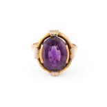 AMETHYST-RING Gelbgold. Ringmaß ca. 53, Ges.-Gew. ca. 5,5 g. Gest. 585. Ein oval facettierter