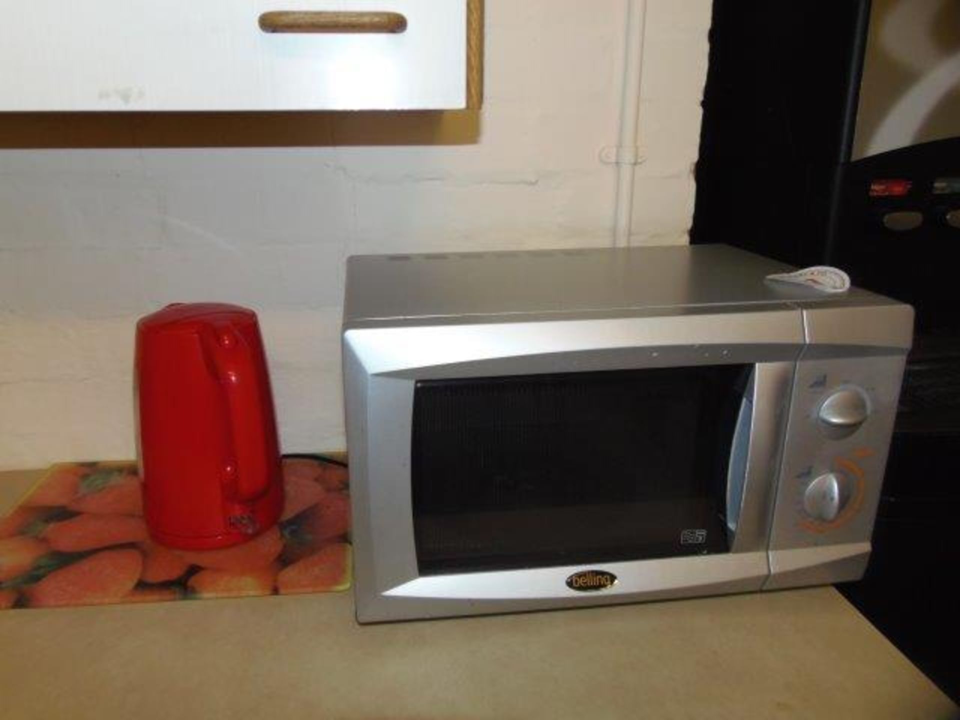 Microwave oven and moveable contents of kitchen