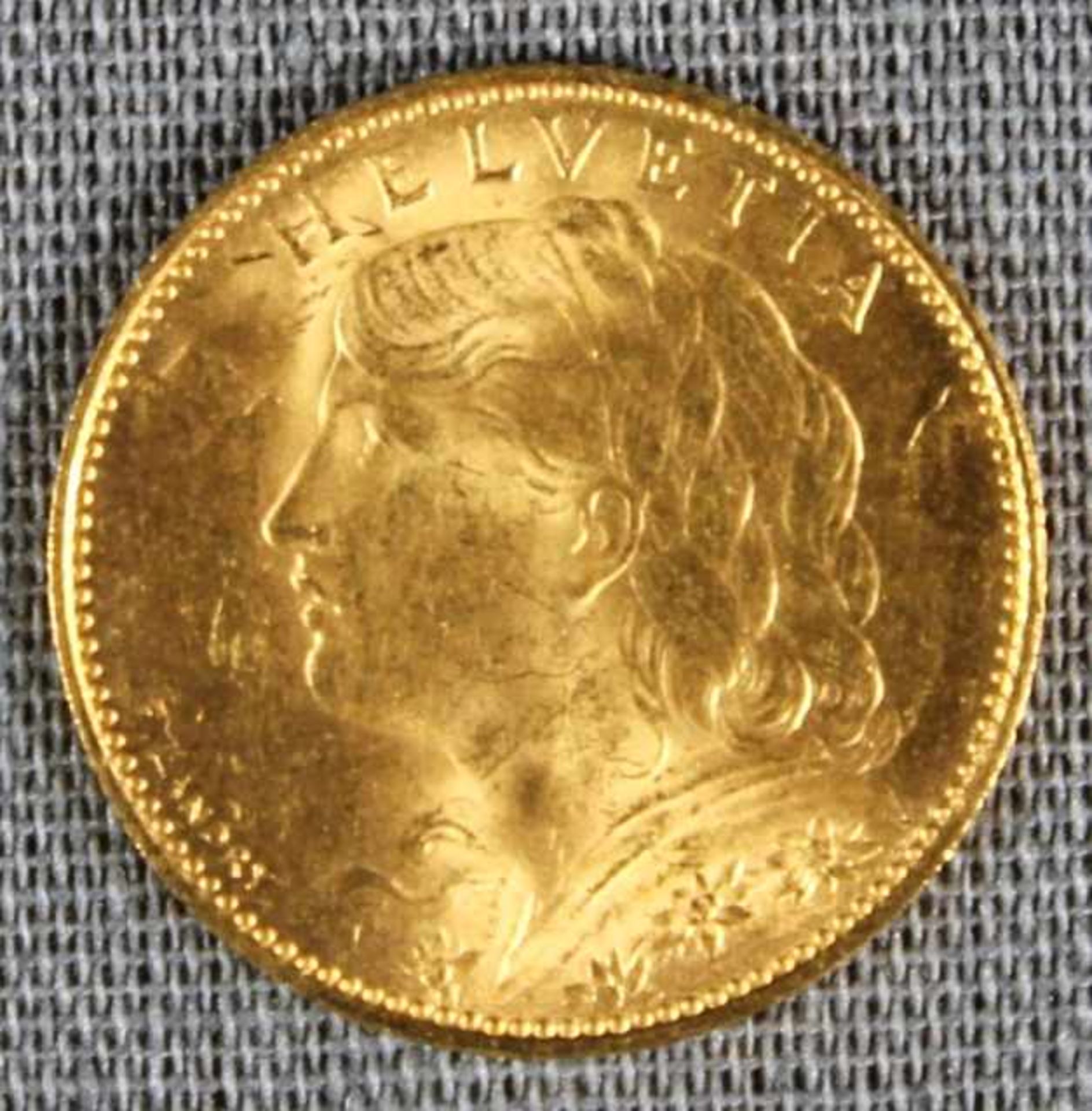 1 kleine Goldmünze (900/000) "10 Francs/Vreneli 1922", 3,22g, Feingewicht 2,90g, D 19mm, sehr schöne
