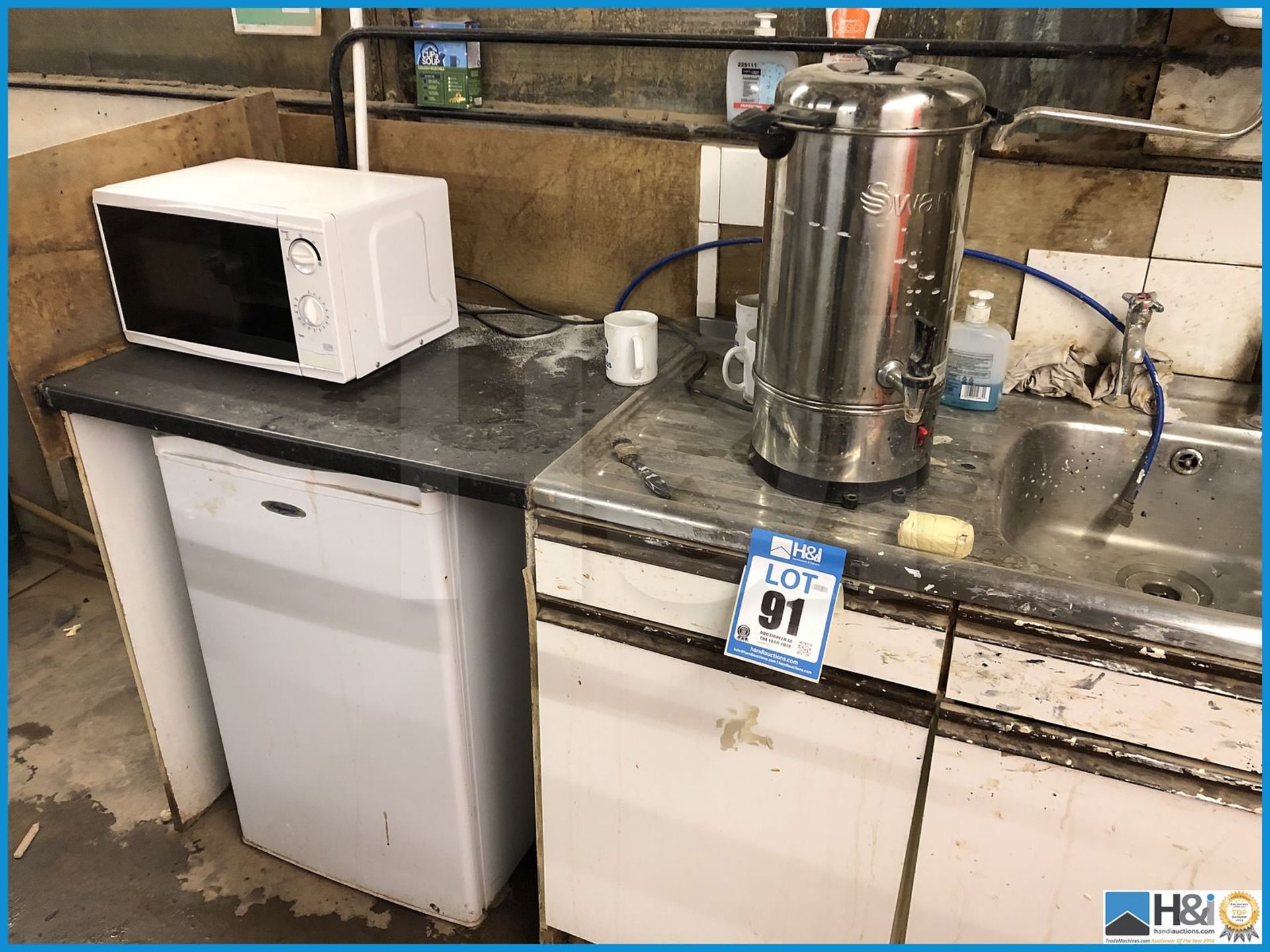 Mixed lot comprising of Swan water heater, microwave oven and Fridgemaster refrigerator. All appear