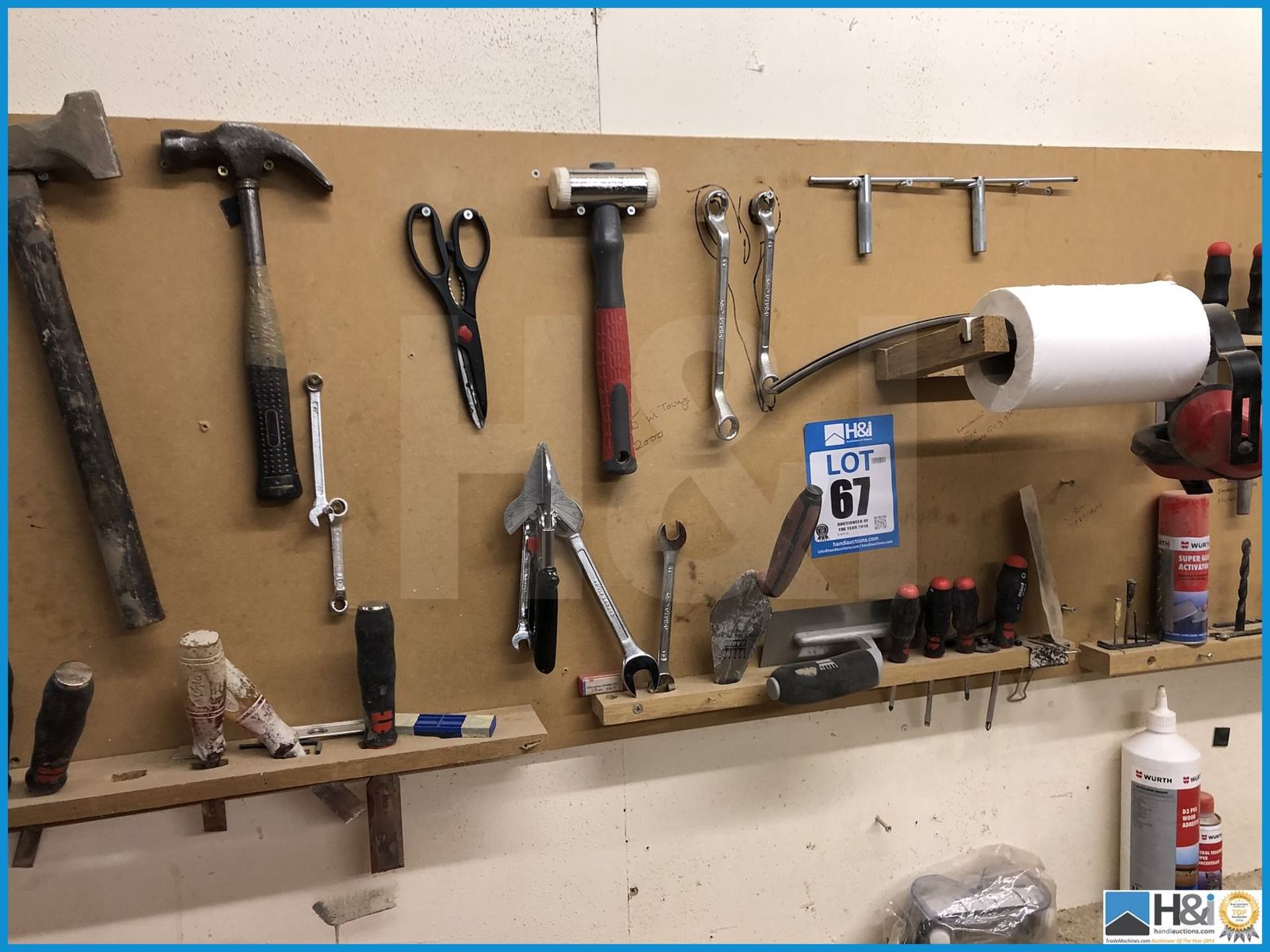 Excellent lot of assorted hand tools to wall board