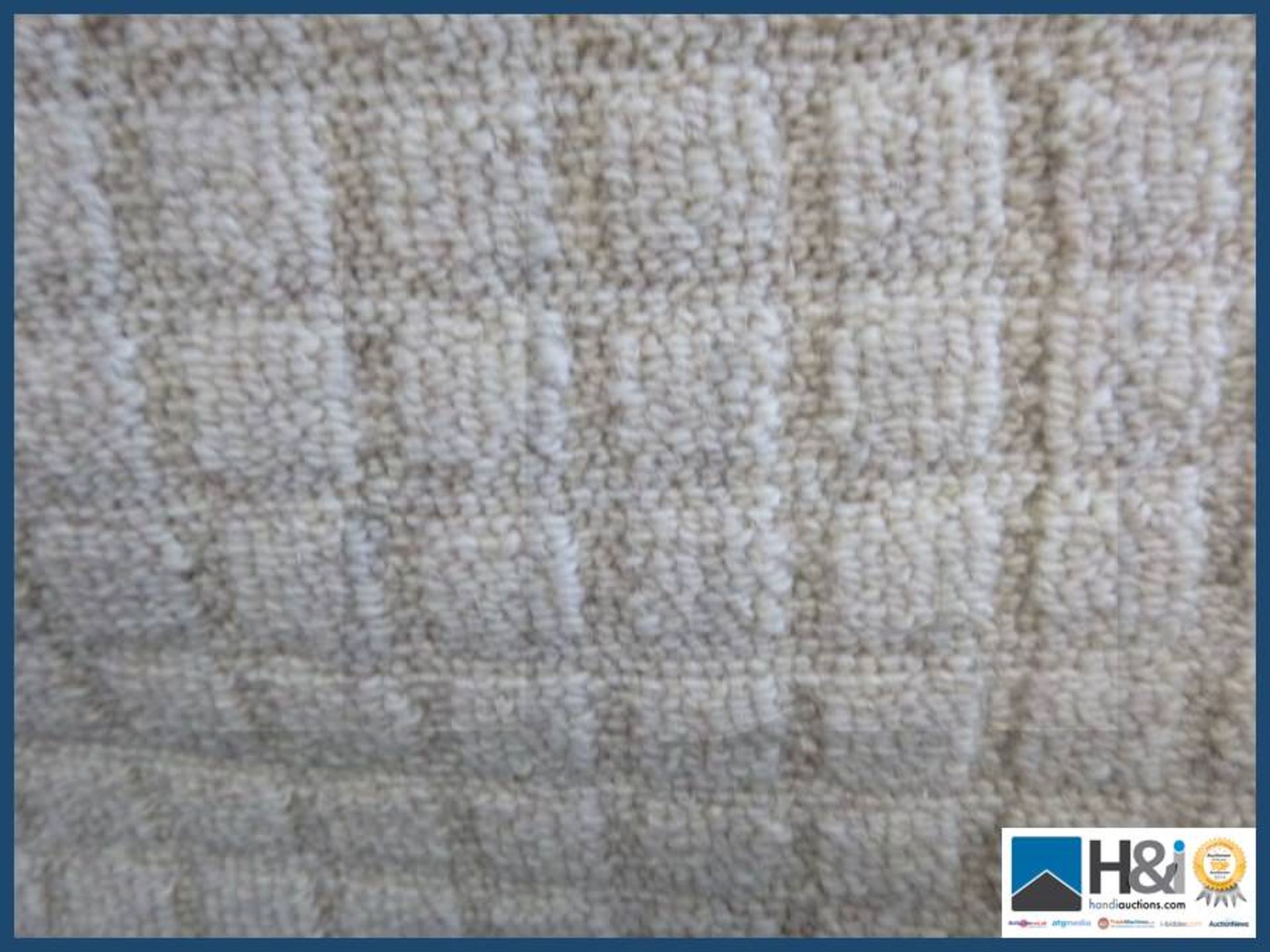 Approx 4m X 3.75m 100% Wool colour off-white textured loop. RRP GBP 25 per square meter.