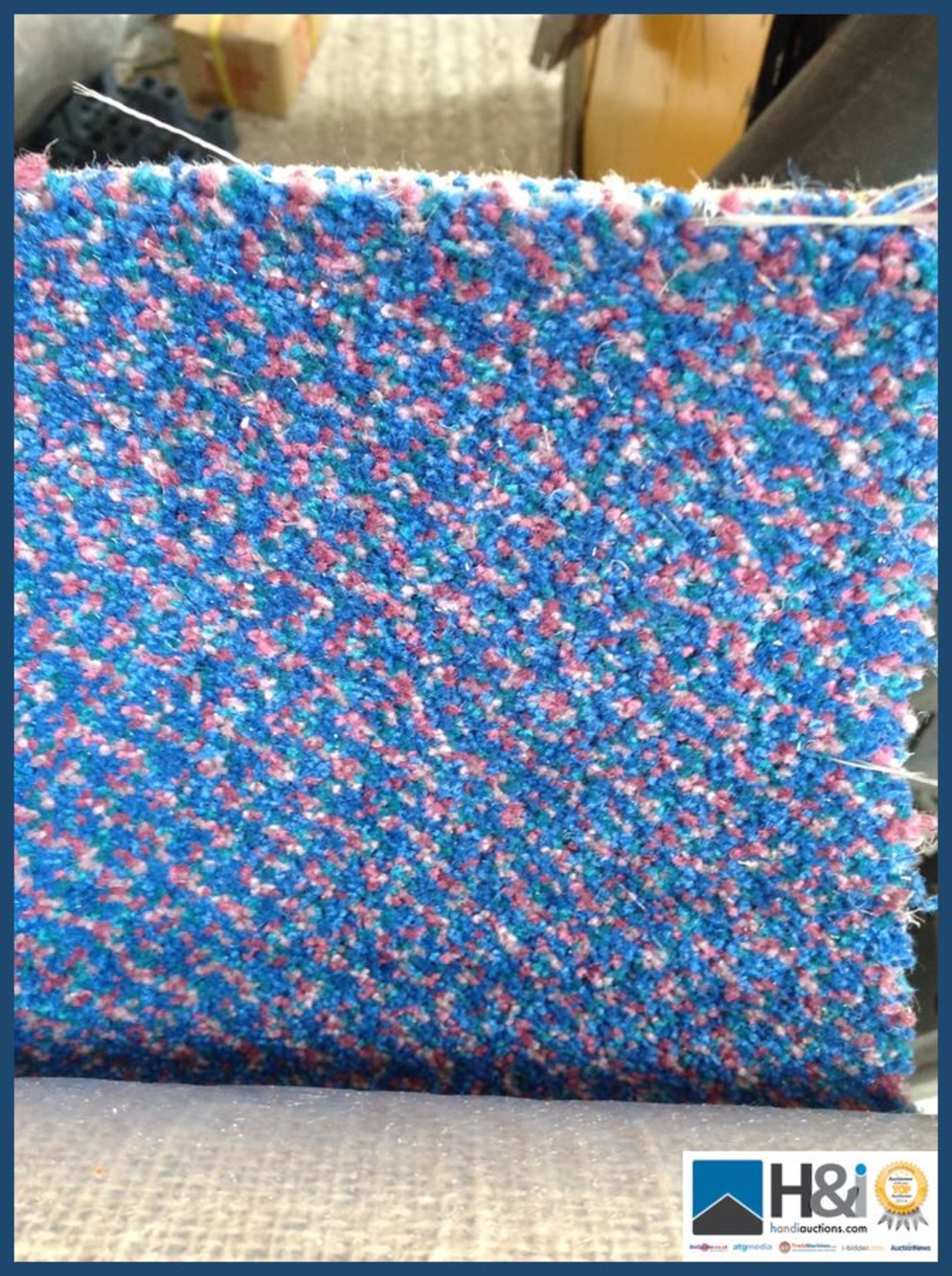 Approx 4.50 x 4.00 of 80% wool twist pile carpet. Heavy wear multicolour geometric design. Blue/gree