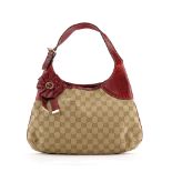 Gucci - petit sac Hobo en toile monogram et python rouge - le côté orné d'une cocarde - 21x34 cm /