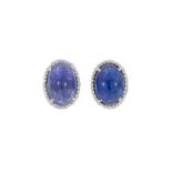 Paire de clous d'oreilles or gris 585 sertis de cabochons de tanzanite rehaussés de diamants taille