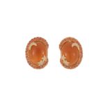 Paire de clous d'oreilles or rose 750 sertis de cabochons de pierre de soleil. diamants et saphirs o