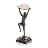 Max le Verrier (1891-1973). Danseuse. 1923. lampe figurant une sculpture en métal à patine verte sou