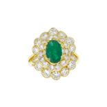 Piaget. bague or 750 sertie d'une émeraude taille ovale entourée de diamants taille brillant. signée