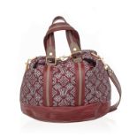 Vuitton. sac Aviator édition limitée prefall 2010 en jacquard Monogram bordeaux. bandoulière. housse