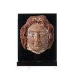 Masque de Méduse en terre cuite. Basse-Égypte. Égypte gréco-romaine. h. 10.2 cm