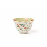 A CHINESE PORCELAIN BOWL DECORATED WITH FLOWERS AND INSECTS