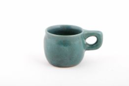 LAURITZ HJORTH - A SMALL CELADON COLOUR POTTERY MUG