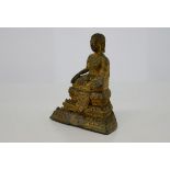 AN ANTIQUE SOUTHEAST ASIAN GILT BRONZE BUDDHA