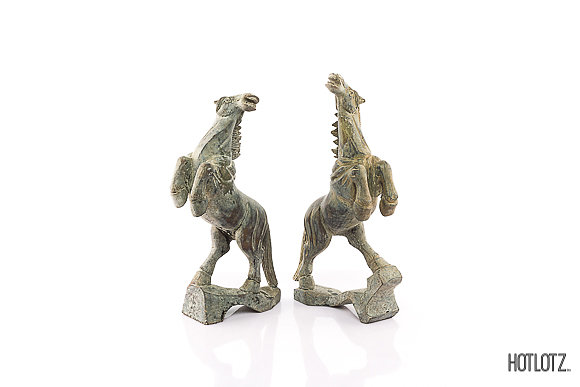 A PAIR OF CHINESE CARVED STONE HORSES