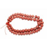 61 ANTIQUE JAVANESE BRICK-RED GLASS BEADS