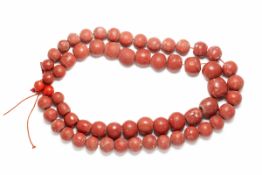 61 ANTIQUE JAVANESE BRICK-RED GLASS BEADS