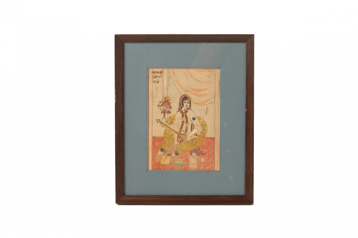 AN ANTIQUE INDIAN PAINTING OF A MOGHUL SONGSTRESS