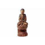 A SOUTHEAST ASIAN WOODEN SCULPTURE OF THE BUDDHA MEDITATING (78CM HIGH)