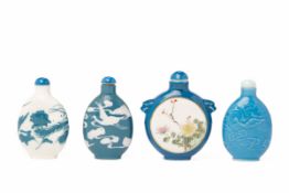 FOUR BLUE AND WHITE PORCELAIN SNUFF BOTTLES