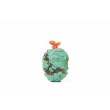 A CARVED TURQUOISE SNUFF BOTTLE WITH CORAL BUTTERFLY STOPPER