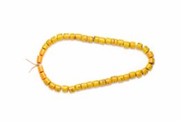 42 ANTIQUE INDIAN YELLOW AND ORANGE GLASS BEADS