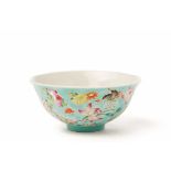 A STRAITS CHINESE STYLE PORCELAIN TEA BOWL WITH TURQUOISE BACKGROUND