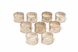 NINE SILVER PLATED NAPKIN RINGS