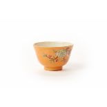 A CHINESE PORCELAIN CORAL GROUND BOWL