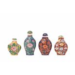 FOUR FLORAL PORCELAIN SNUFF BOTTLES