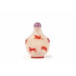 AN 'EIGHT HORSES' RED OVERLAY GLASS SNUFF BOTTLE