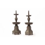 A PAIR OF ANTIQUE CHINESE PEWTER CANDLESTICKS