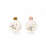 A PAIR OF OVOID PORCELAIN SNUFF BOTTLES