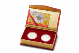 A 2009 'TWO SINGAPORE DOLLARS' OX DOUBLE JOY SET (2)