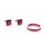 AN 18K WHITE GOLD AND RUBY ETERNITY RING AND EARRINGS