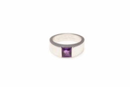 CARTIER - AN 18K WHITE GOLD AND AMETHYST 'TANK' RING