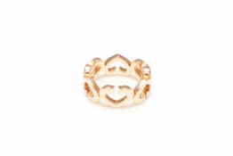 CARTIER - AN 18K ROSE GOLD AND DIAMOND 'HEART & SYMBOLS' RING