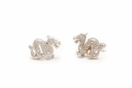 A PAIR OF SILVER CHINESE DRAGON CUFFLINKS