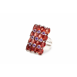 AN 18K WHITE GOLD GARNET AND AMETHYST COCKTAIL RING