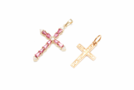 A PAIR OF GOLD AND RUBY CROSSES