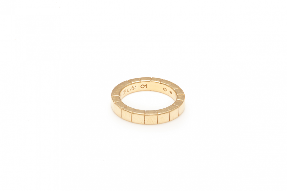 CARTIER - A GOLD MAILLON PANTHERE WEDDING RING